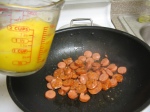 Making Scrambled Eggs with Andouille Sausage